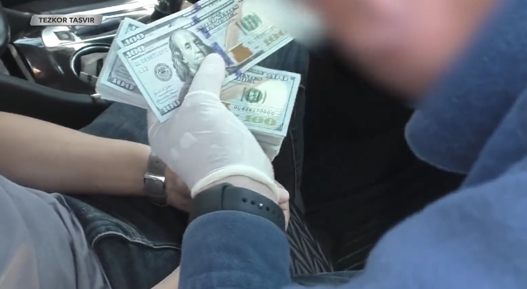 Two power grid company engineers detained in Tashkent while receiving $8,000